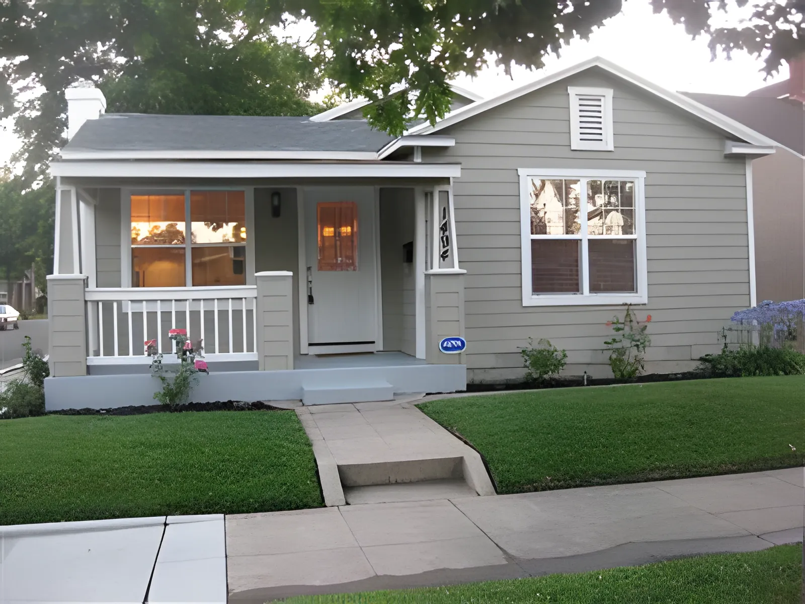 Renovated craftsman bungalow at 1494 34th Street Sacramento with new siding, covered porch, and landscaping