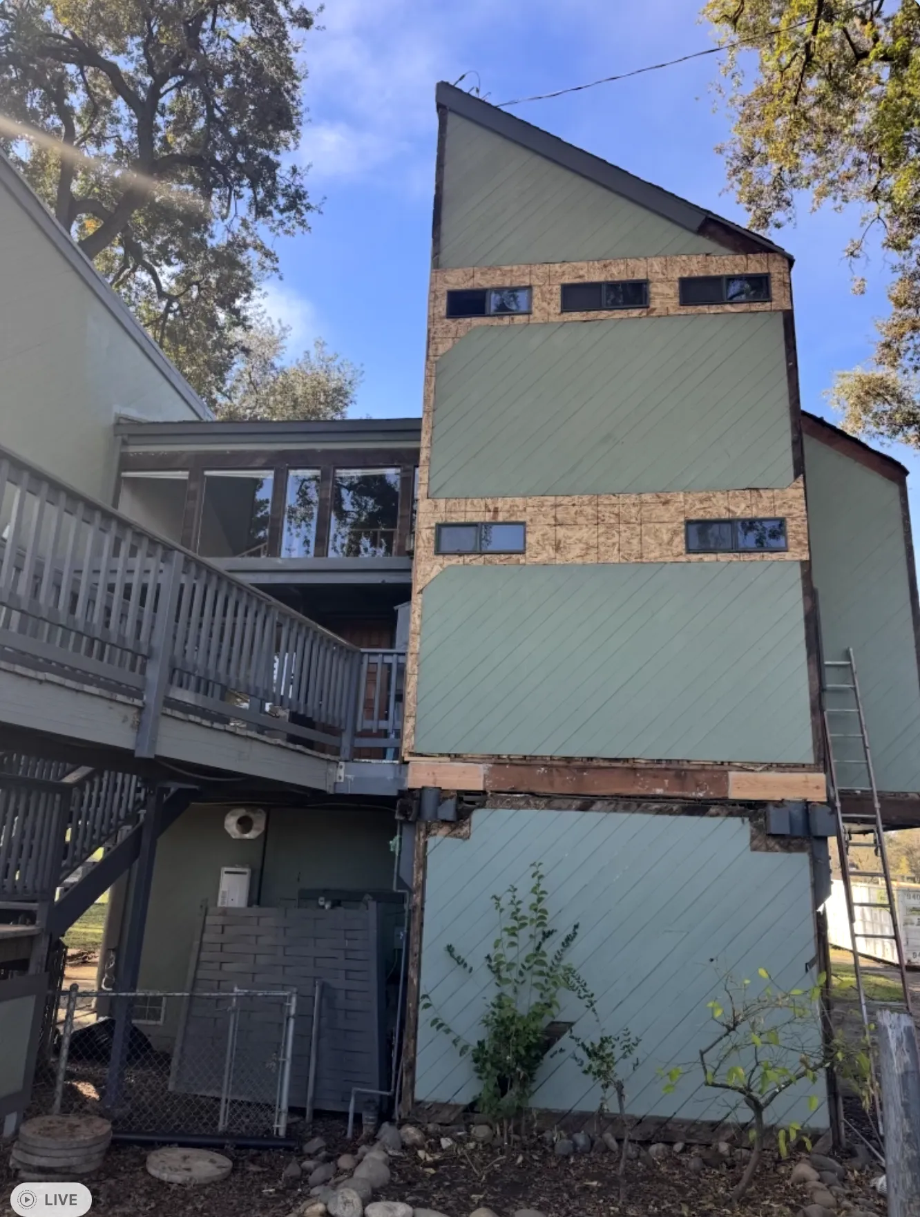 Multi-story residential building at 3777 Garden Highway undergoing renovation