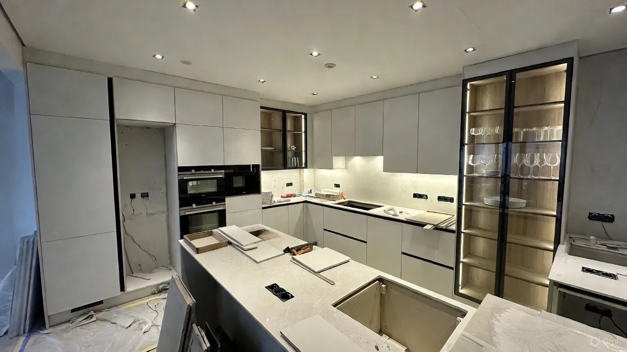 Contemporary kitchen with stone counters and wood cabinets