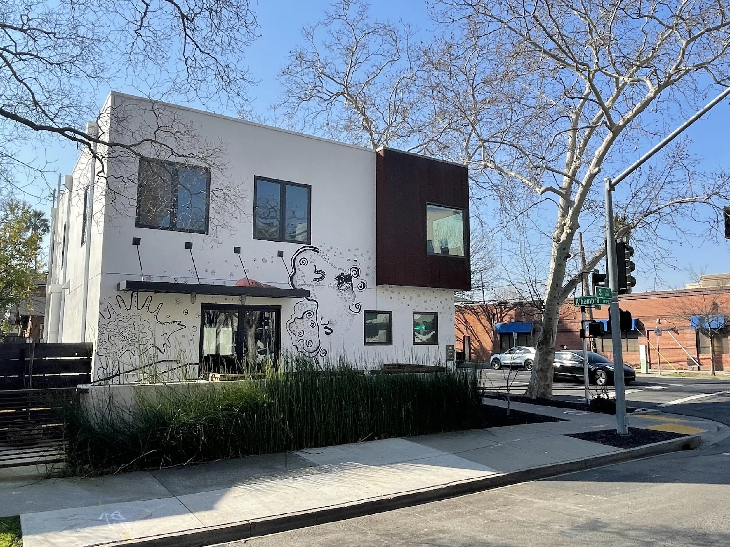 1901 Alhambra Boulevard after renovation - mural side with white exterior